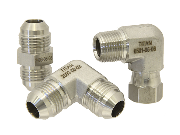 Photo of three Titan Stainless Steel JIC Fittings on white background